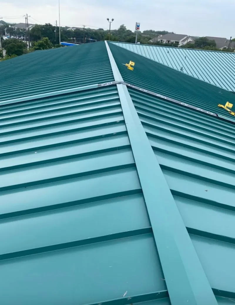 Green commercial metal roof ridge and valley for Metal Roof Repair in Lufkin